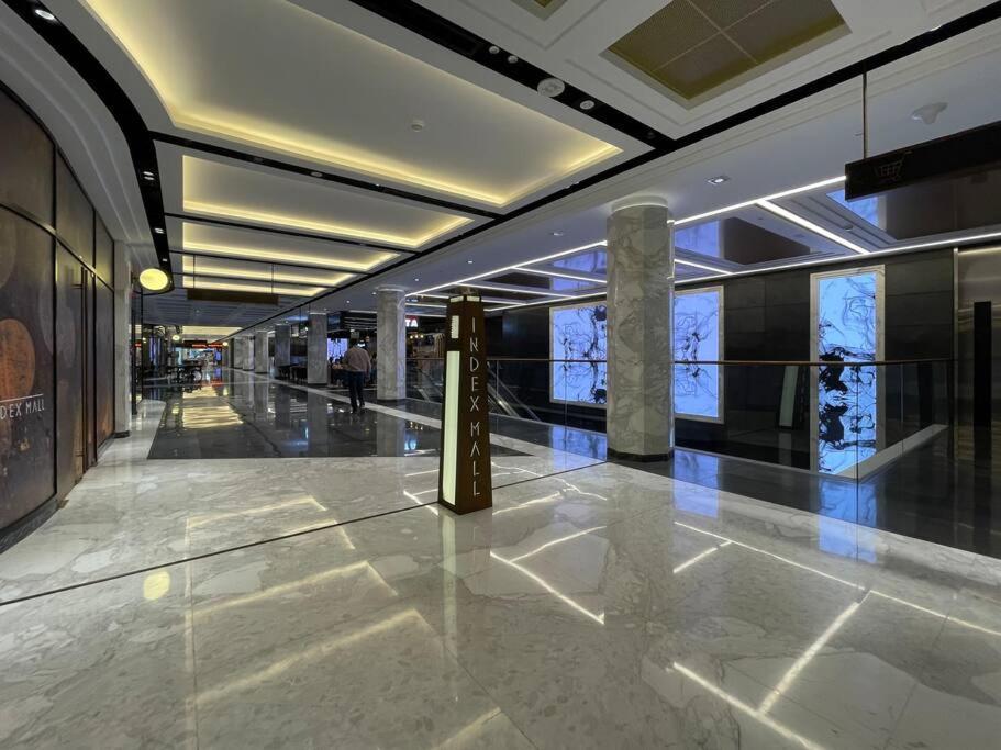 The Smart Concierge - Index Tower Apartment